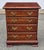 A Late 20th Century Chippendale Style Cherry Four Drawer Bedside Chest / Nightstand. Measures 25" w x 16.5"D x 30.5"H.