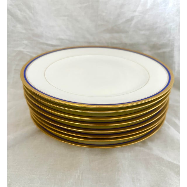 Set of 8 Blue and Gold Rim Dinner plates by C. Ahrenfeldt Tice & Gates Rochester N.Y. 2 of the plates don't have gold on...