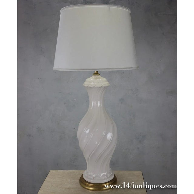 This Spanish 1950s oversized white ceramic lamp with crackle glaze and an antique gold base will bring a stylish and...
