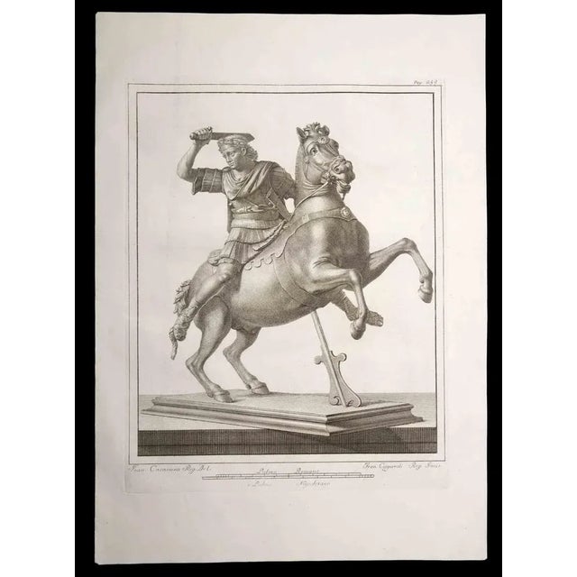 Legionnaire with the horse, ancient roman statue, from the series "antiquities of herculaneum", is an original etching on...