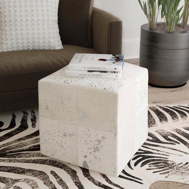 The Butler Specialty Company Victorian hair-on-hide leather ottoman is a glamorous and refined accent for any space....