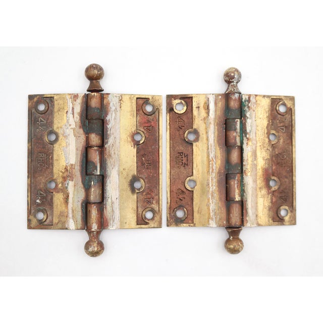 These door hinges are made of brass with ball tips, five knuckles, and a template hole pattern. Made by Reading. The...