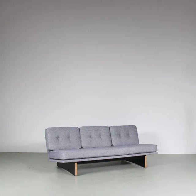A stunning 3-seater sofa designed by Kho Liang Ie and manufactured by Artifort around 1970. This modern piece embodies a...