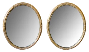 French Napoleon III Carved Giltwood Oval Mirrors - a Pair