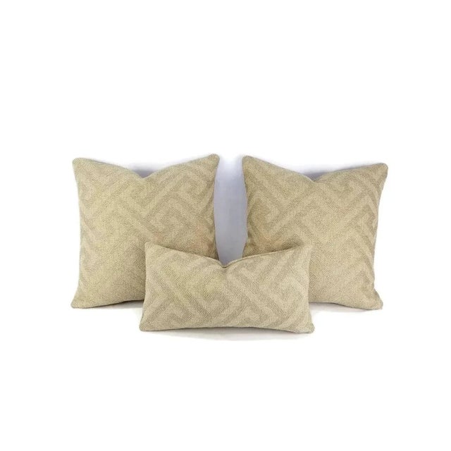 From F. Schumacher is L'Orient Fret in the color Greige pillow cover. Fabric is made from 57% Linen 17% Bamboo, and 15%...