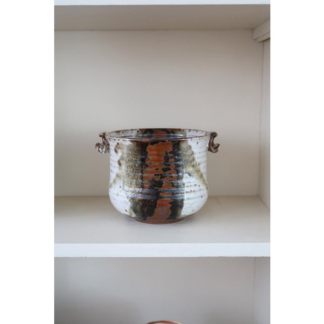 A studio ceramic vessel signed Henny Waldorff, made at the Svaneke workshop on the island of Bornholm. Hand-thrown...