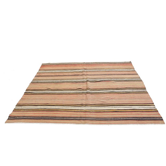 Handwoven vintage striped kilim rug from Denizli region of Turkey. Approximatelly 45-55 years old. In very good condition.