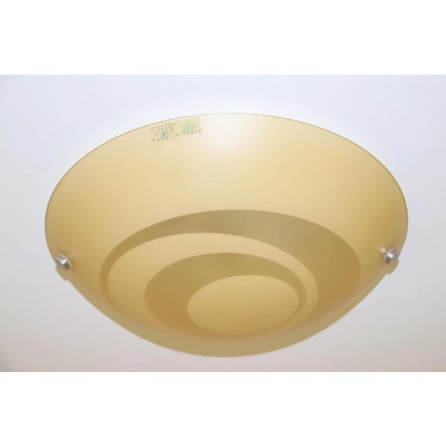 GIRO Ceiling Lamp Murano Curved Amber Glass with Translucent Spiraling Stripes. Satin Finish and White Satin Details....