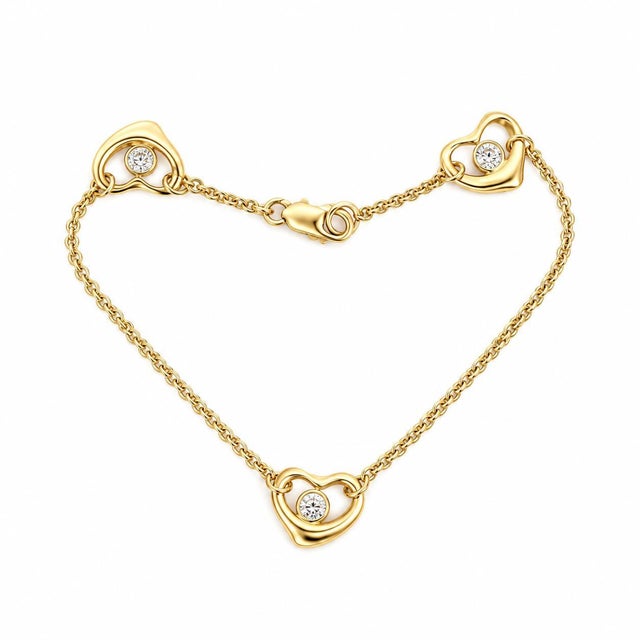 Tiffany and Co. Elsa Peretti 18k Yellow Gold Diamond Heart Bracelet For Sale - Image 4 of 5