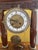 The woodwork has been restored and is functional, but should be checked by a watchmaker. Key included.