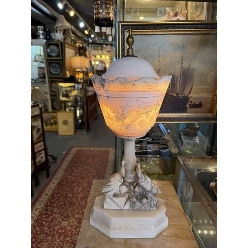 Victorian Hand Carved Alabaster Table Lamb with Bird Motif. Interesting design with a removable lid to change light bulbs....