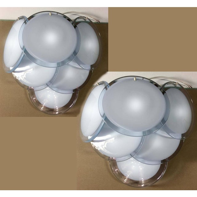 Each item made six discs of precious Murano glass are arranged on three levels. The color of the glasses changes according...