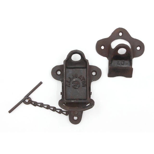 This antique padlock latch is made of a black cast iron finish. This style is known as Alligator, 35-1 latch. It is...