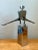 Sculpted with dynamic athletic balance and sleek minimalist lines, this vintage mid-century modern figurative sculpture...