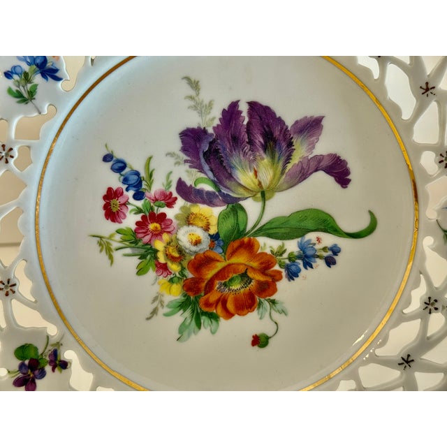 An exceptional pair of antique porcelain reticulated plates made in Dresden Germany. The condition is excellent with...