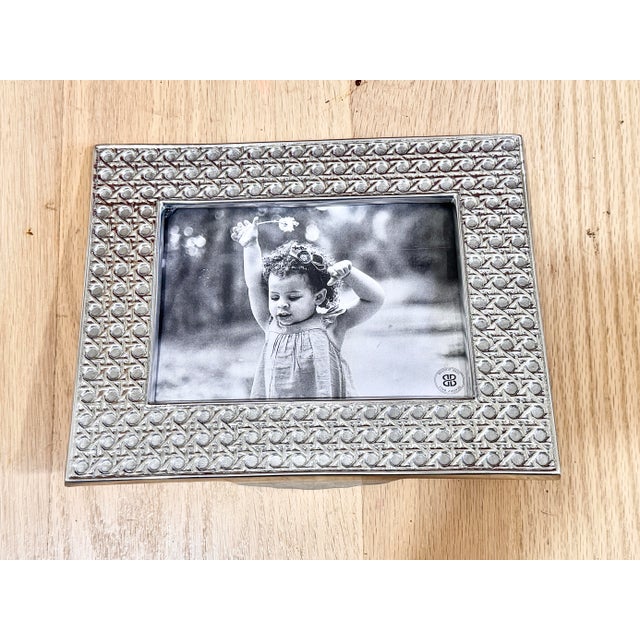 Lovely Beatriz Ball picture frame from their Sierra Modern Rattan collection. Frame dimensions: 9.5 x 7.75 x 2.5”. Picture...