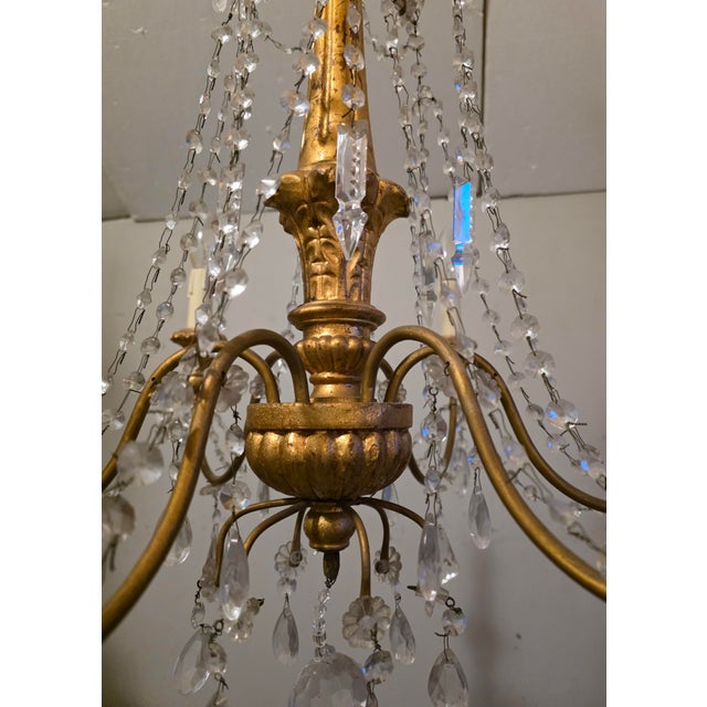 Genoese Chandelier in Gilded Wood and Crystals, 1950s, in Very Good conditions. Designed 1950 to 1959 Up to 250V...