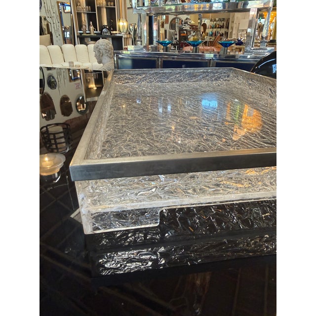 Stylish Italian mid-century serving tray crafted in the 1970s, featuring a striking crushed ice acrylic surface framed by...
