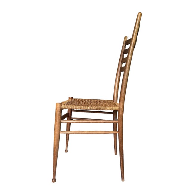 Amazing Midcentury ladder back chair with woven rope seat.