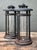 Enhance your home with this exceptional pair of vintage wrought iron lanterns, embodying a rugged industrial aesthetic...