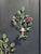 Rose lovers candle sconces in richly painted greens reds and pinks. Very sturdy metal work.
