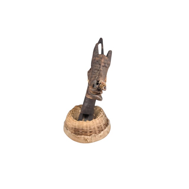 A striking 20th-century horizontal Chi Wara antelope headdress attributed to the Bamana (Bambara) people of Mali, West...