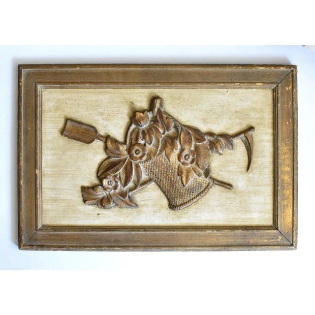 An antique, 18th-century, c. 1780, French, Louis XVI over-door carved giltwood wall panel, with a pastoral assembly of a...