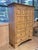 An exceptional 19th-century Irish scrub pine clothing armoire, distinguished by its beautifully weathered honey-toned...