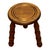 French Rustic Stool, Circa 1920. This French rustic stool, circa 1920, is made of mahogany, with three turned legs and a...