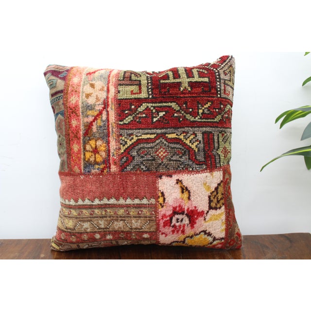 This Turkish pillow cover is made from the highest quality vintage kilim in 100% wool on the front. The back is covered in...