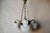 A vintage chandelier, the kind you dream of to add character to any interior! This beautiful four-light Art Deco...