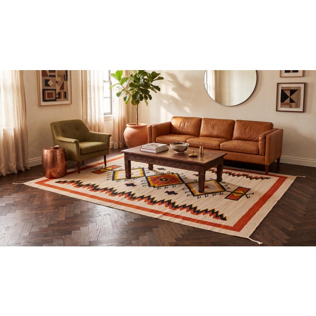 Elevate your space with this modern hand-woven wool rug, blending rich Southwestern heritage with upscale contemporary...