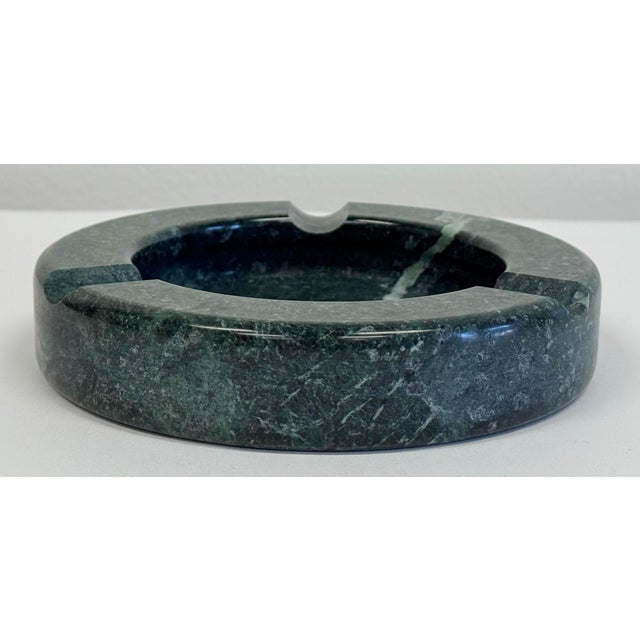 Vintage green solid marble ashtray with nice veining throughout. Alternative use as a wine coaster or trinket dish. Clean...