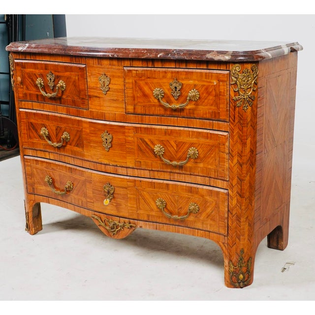 A true designer “show-stopper”—where bold parquetry geometry meets dramatic marble and gilded French ornament. This is a...