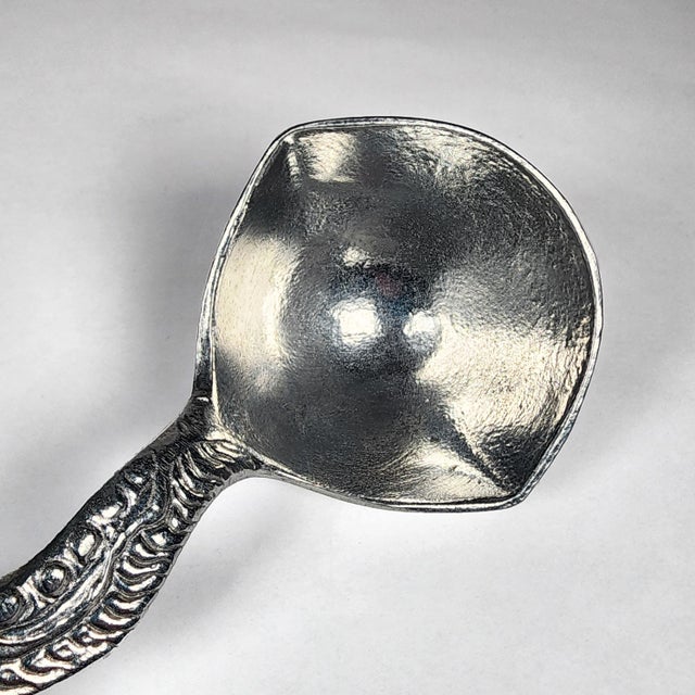 On offer is this wonderful and unique Don Drumm aluminum serving ladle. It features a curved handle with the artist's...