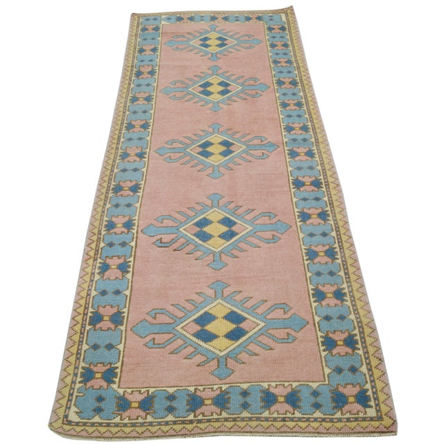 Vintage Turkish Oushak hand knotted rug with natural colors, contemporary style and soft texture.