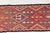 This is a vintage Turkish Oushak rug from the Mid 20th Century. The piece was hand-knotted.