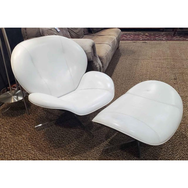 This is a genuine Ligne Roset white leather lounge chair and ottoman set. Made in France, it's modern sculptural design...