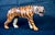 A spectacular Italian sculpture depicting a tiger in motion, mouth open, dating from the 1960s–1970s. with its elegant...