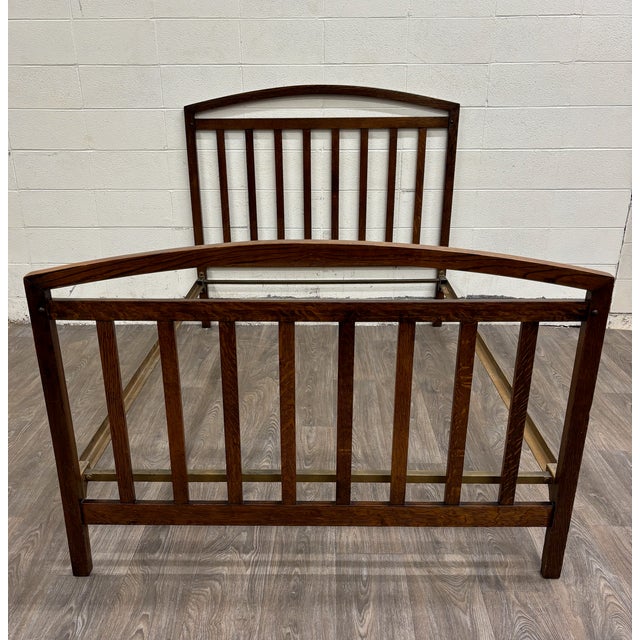 This is an antique Arts & Crafts Mission full sized bed by Northwestern Manufacturing Company of Fort Atkinson, Wisconsin....