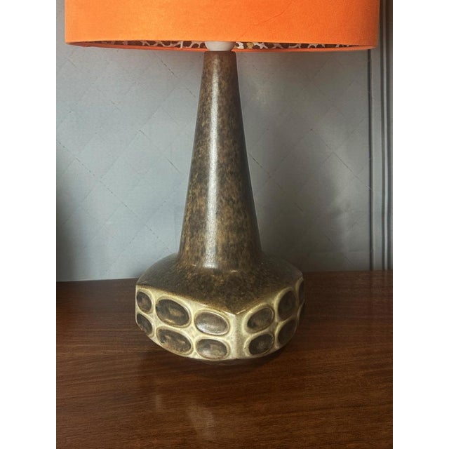 A stunning 1960's mid-century ceramic lamp, designed by Marianne Stark for Michael Andersen & Son. The lamp captures the...