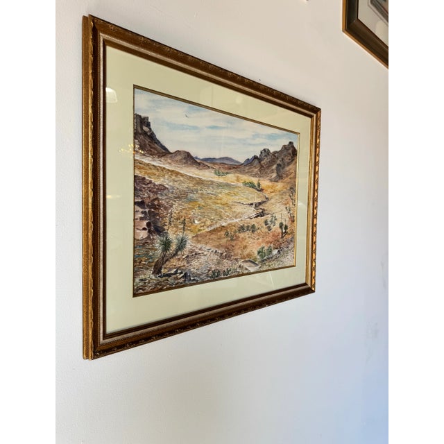 This stunning 1980s vintage watercolor painting by Joe Yeager captures the raw beauty of a desert landscape with...
