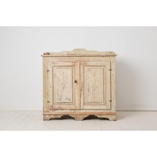 Classic sideboard from the gustavian period during the late 1700s. Made by hand with a frame in solid pine in Northern...