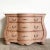 Experience a blend of style and practicality with our Boho Chic Wicker Tessellated Stone Top Chest of Drawers. This...