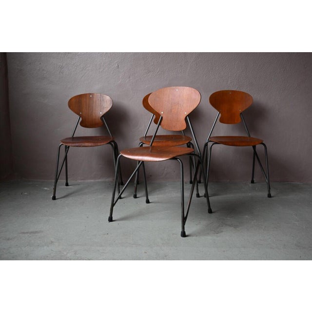 These tubular chairs are a superb creation by Danish designers Steen Eiler Rasmussen and Kai Lyngfeldt Larsen. Produced by...