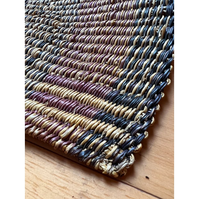 A medium/large, hand woven fan with leather handle great for his proper use or for dressing up your home. Acquired at an...