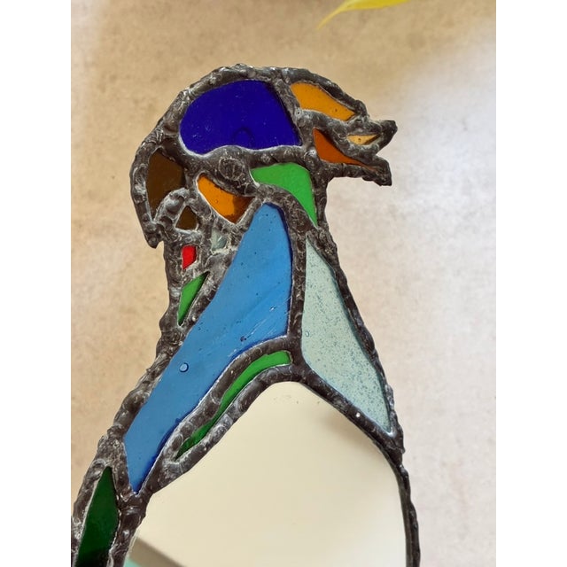 Gorgeous pair of vintage leaded stained glass parrot mirrors. Masterfully crafted using traditional leaded glass...