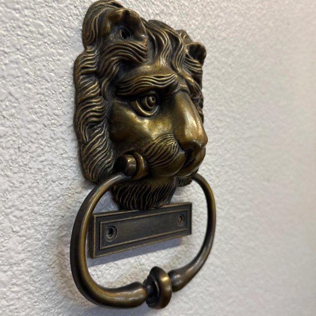 Vintage brass door knocker. Handsome classic with small knock plate - circle. 7.5” tall x 5” wide.