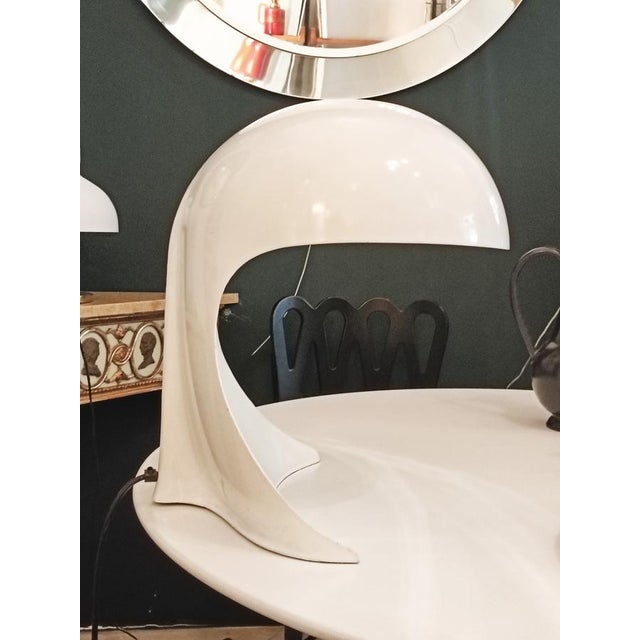 A rare Italian table lamp, the Dania model, designed by Dario Tognoni for Artemide, the Dania lamp is a sought-after...