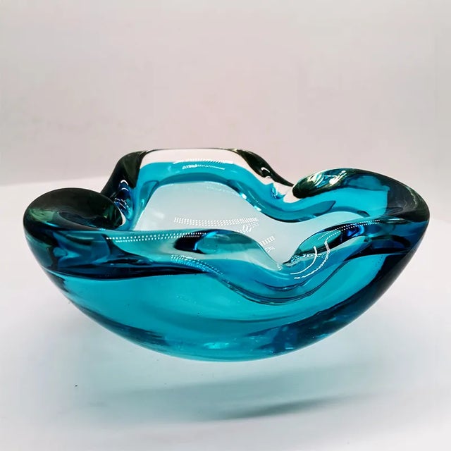 Vintage Ashtray or Catch-all in Murano Glass by Flavio Poli for Seguso. Two Submerged color: Ligh Blue with shades of Sky...